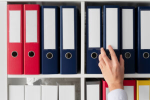 Keeping files and invoices organized in labelled files