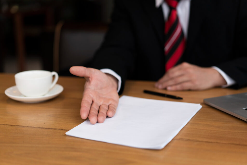 a person having document on table about estate planning